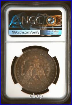 1883 O $1 United States Silver Morgan Dollar MS 62 NGC Graded Toning
