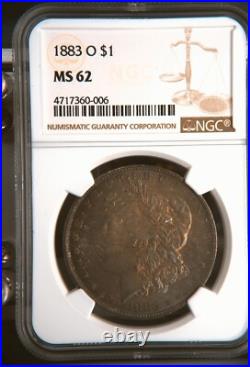 1883 O $1 United States Silver Morgan Dollar MS 62 NGC Graded Toning