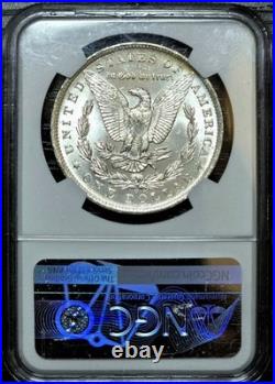 1883-O Morgan Silver Dollar NGC MS63 Rainbow Textile Bag Toned Coin
