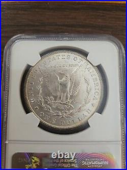 1883 O Morgan Silver Dollar NGC MS64 Rainbow Toned (FULL RAINBOW)