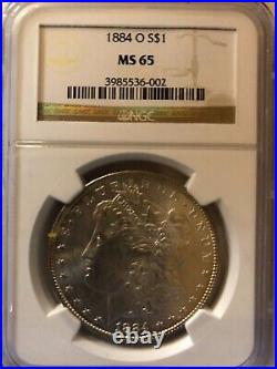 1884-0 NGC Morgan Silver Dollar MS-65 graded and guaranteed by NGC as being MS