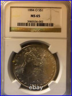 1884-0 NGC Morgan Silver Dollar MS-65 graded and guaranteed by NGC as being MS
