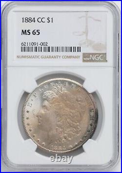 1884-CC Morgan Silver Dollar, NGC MS65, Sand Glossed, Rainbow Toned Edge, Luster