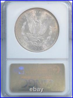 1884-CC Morgan Silver Dollar NGC graded MS 64 Light Gold Toning