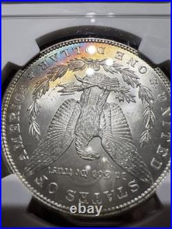 1884 NGC MS62 Morgan Silver Dollar with a Touch Of Duel Sided Rainbow Toning