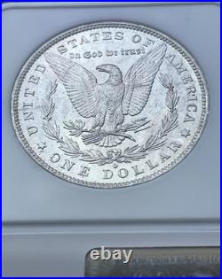 1884-O Morgan Silver Dollar NGC MS61 Toned Crescent Obv, Frosty Reverse