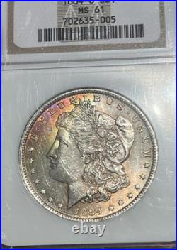 1884-O Morgan Silver Dollar NGC MS61 Toned Crescent Obv, Frosty Reverse