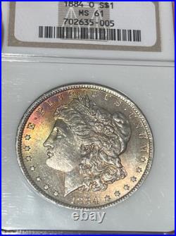 1884-O Morgan Silver Dollar NGC MS61 Toned Crescent Obv, Frosty Reverse