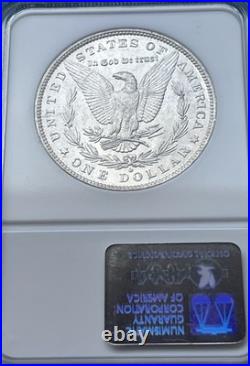 1884-O Morgan Silver Dollar NGC MS61 Toned Crescent Obv, Frosty Reverse