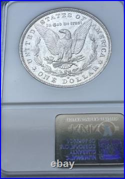 1884-O Morgan Silver Dollar NGC MS61 Toned Crescent Obv, Frosty Reverse