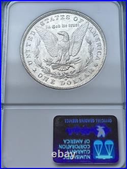 1884-O Morgan Silver Dollar NGC MS61 Toned Crescent Obv, Frosty Reverse