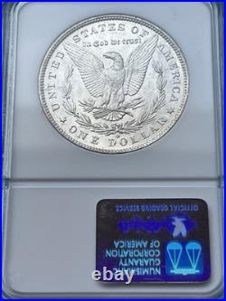 1884-O Morgan Silver Dollar NGC MS61 Toned Crescent Obv, Frosty Reverse