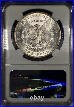 1885-O Morgan Dollar NGC MS64 Vibrant Aqua Blue Rainbow Toned