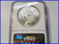 1885 O Silver Morgan Dollar NGC MS 63 STAR Rainbow Crescent Toned Toning Coin