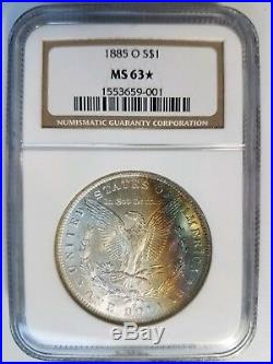 1885 O Silver Morgan Dollar NGC MS 63 STAR Rainbow Crescent Toned Toning Coin