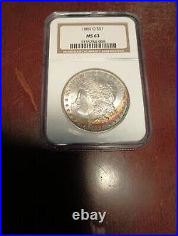 1885-O Vibrant Rainbow Toned Morgan Silver Dollar NGC MS63. Absolutely Gorgeous