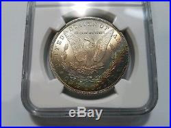 1885 Silver Morgan Dollar NGC MS 64 Star Monster Rainbow Crescent Toned Toning