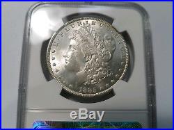 1885 Silver Morgan Dollar NGC MS 64 Star Monster Rainbow Crescent Toned Toning