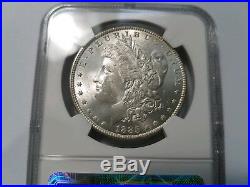 1885 Silver Morgan Dollar NGC MS 64 Star Monster Rainbow Crescent Toned Toning