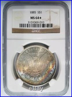 1885 Silver Morgan Dollar NGC MS 64 Star Monster Rainbow Crescent Toned Toning