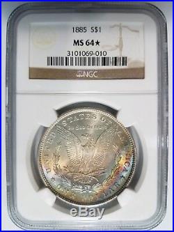 1885 Silver Morgan Dollar NGC MS 64 Star Monster Rainbow Crescent Toned Toning