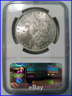 1885 Silver Morgan Dollar NGC MS 64 Star Monster Rainbow Crescent Toned Toning