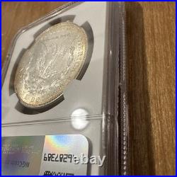 1887 Original Bag Fragment Toned Morgan Silver Dollar $1 NGC BU Brilliant UNC
