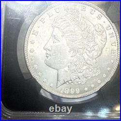 1899 $1 Morgan Silver Dollar NGC MS62 Vault Box Mintage 330,846