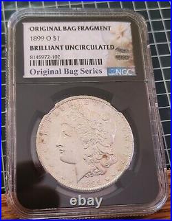 1899-O Morgan Silver Dollar with Original Bag Fragment WITH INK NGC Relic BU