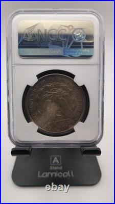 1900 O Morgan Silver Dollar NGC MS 62 Terminal Toner with some color