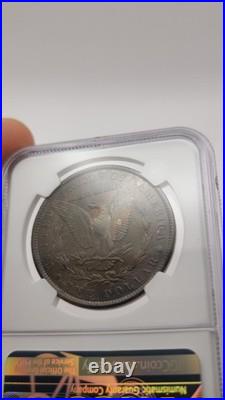 1900 O Morgan Silver Dollar NGC MS 62 Terminal Toner with some color
