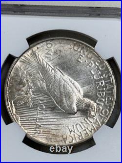1923 D Peace Silver Dollar NGC AU58